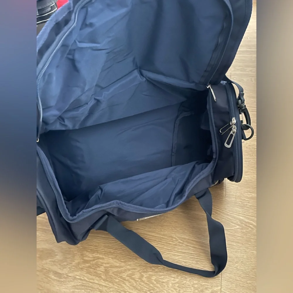 Bella Russo navy blue duffle bag
